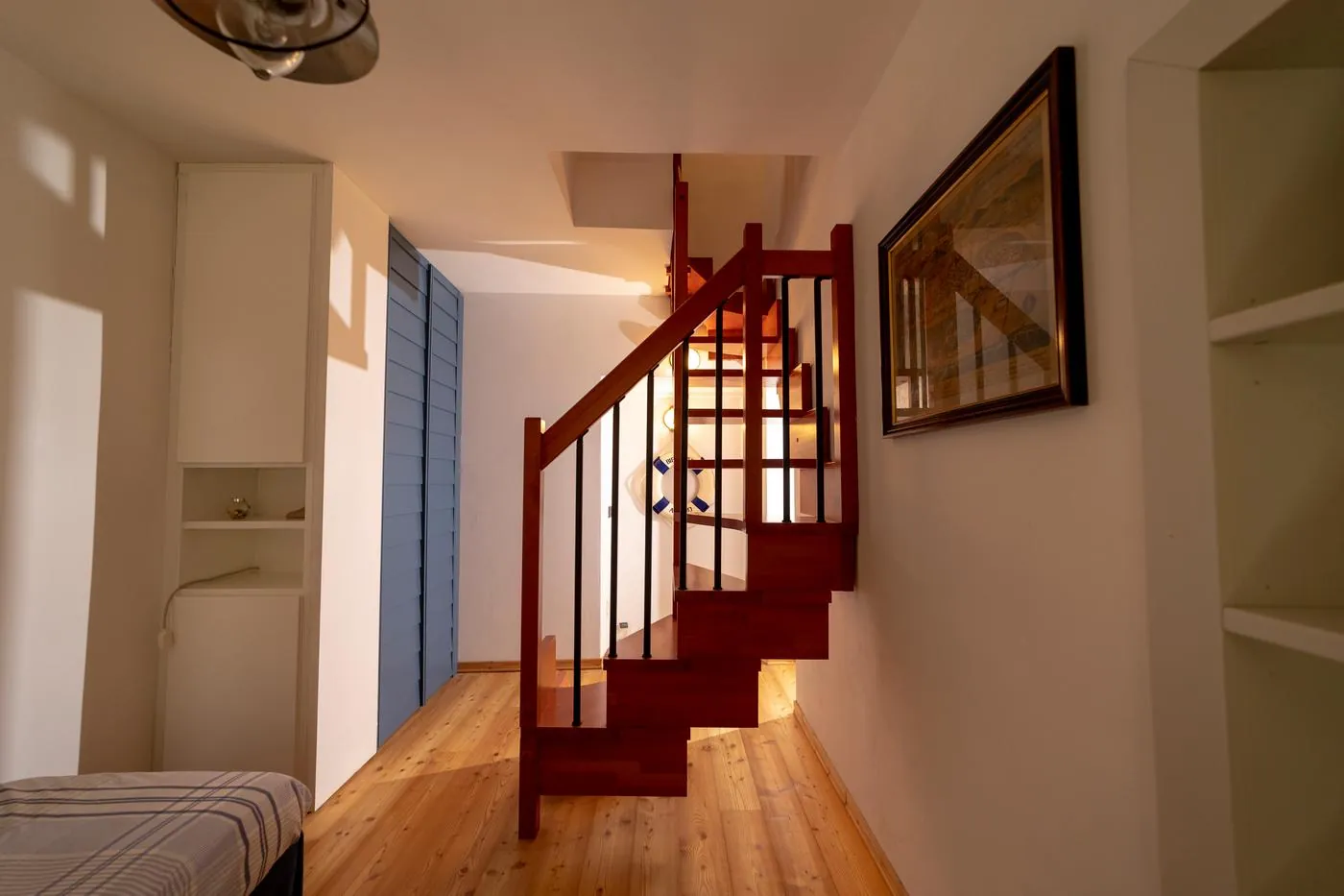 Lower bedroom and spiral staircase