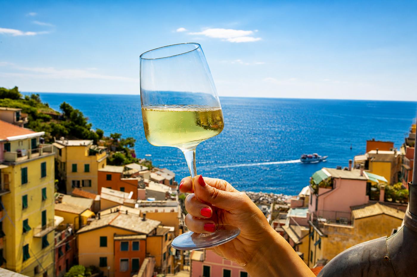 Glass of wine overlooking the sea in Riomaggiore